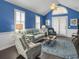 Inviting living room with hardwood floors, vaulted ceiling, and ample natural light at 2419 Tuscany Dr, North Charleston, SC 29406