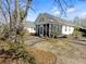 Charming home with a screened-in porch and a well-maintained yard in a serene backyard setting at 2419 Tuscany Dr, North Charleston, SC 29406