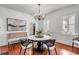 Bright dining room with stylish chairs and a striking centerpiece at 25 Logan St, Charleston, SC 29401