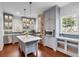 Modern kitchen with marble countertops, stainless steel appliances, and custom cabinets at 25 Logan St, Charleston, SC 29401