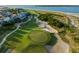 Beautiful aerial view of a golf course community on the coast with stunning ocean views and beach access at 27 Ocean Point Dr, Isle of Palms, SC 29451