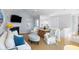 Cozy living room with a fireplace, stylish decor, and comfortable seating at 27 Ocean Point Dr, Isle of Palms, SC 29451
