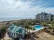 Stunning pool, pavilion, and ocean views from this beautiful resort-style condo building at 27 Ocean Point Dr, Isle of Palms, SC 29451