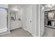 Bathroom with a glass shower, vanity with neutral wall color, and access to closet at 3213 Great Egret Dr, Johns Island, SC 29455