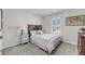 Charming bedroom with cozy decor, featuring a turtle headboard and bright window at 3213 Great Egret Dr, Johns Island, SC 29455