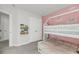 bedroom showcasing a white bunk bed with pastel pink accents and a decorative bookshelf at 3213 Great Egret Dr, Johns Island, SC 29455