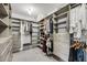 Walk-in closet with custom shelving, drawers, and ample storage for organization at 3213 Great Egret Dr, Johns Island, SC 29455