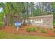 Saint John's Lake community sign surrounded by palm trees and pine trees at 3213 Great Egret Dr, Johns Island, SC 29455