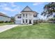 Charming two-story home with a well-manicured lawn and inviting curb appeal at 3213 Great Egret Dr, Johns Island, SC 29455