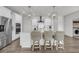 Modern kitchen with stainless steel appliances, a center island, and counter seating at 3213 Great Egret Dr, Johns Island, SC 29455