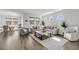 Spacious living area with a large couch, neutral decor, and plenty of natural light at 3213 Great Egret Dr, Johns Island, SC 29455
