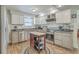 Well-equipped kitchen with stainless steel appliances, ample counter space, and an island at 501 E Richardson Ave, Summerville, SC 29485