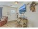 Cozy living room features a stylish console table, mounted TV, and unique decor at 501 E Richardson Ave, Summerville, SC 29485