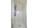 Bathroom with shower features a chrome shower head, attached shelf and decorative lavender hanging on the fixture at 501 E Richardson Ave, Summerville, SC 29485