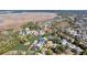 Serene aerial view of a residential neighborhood with stunning lakefront properties and lush greenery at 547 Island Walk, Mount Pleasant, SC 29464