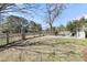 Serene backyard with water view, fire pit, and lush greenery at 547 Island Walk, Mount Pleasant, SC 29464