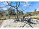 Outdoor patio with fire pit, seating, and a tranquil lakeside backdrop at 547 Island Walk, Mount Pleasant, SC 29464