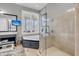 Stylish bathroom with a soaking tub, seamless glass shower, large window, and sleek vanity at 547 Island Walk, Mount Pleasant, SC 29464