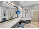 Bright bathroom featuring a large soaking tub, a seamless glass shower, and an expansive vanity at 547 Island Walk, Mount Pleasant, SC 29464