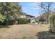 Back exterior with screened porch, patio, and ample backyard space at 547 Island Walk, Mount Pleasant, SC 29464