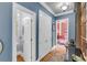 Hallway with access to a powder room, storage closet, and sitting room at 547 Island Walk, Mount Pleasant, SC 29464