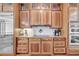 Well-appointed kitchen features stainless steel appliances, light wood cabinets, and granite countertops at 547 Island Walk, Mount Pleasant, SC 29464