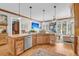 Stylish kitchen island with countertop seating and views to the open living area at 547 Island Walk, Mount Pleasant, SC 29464