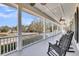 Inviting outdoor porch with rocking chairs and scenic views, ideal for relaxation at 547 Island Walk, Mount Pleasant, SC 29464
