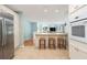Bright kitchen with stainless steel appliances, breakfast bar, and open floor plan at 6 4Th Ave, Isle of Palms, SC 29451