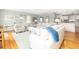 Inviting living room featuring hardwood floors, soft-toned furniture, and an open layout to the kitchen and dining space at 6 4Th Ave, Isle of Palms, SC 29451