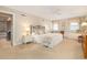 This bedroom features a main bed, a side bed, neutral walls, and an ensuite entry for convenient access at 6 4Th Ave, Isle of Palms, SC 29451