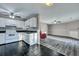 Open living space featuring sleek flooring, neutral walls, ceiling fans, and a seamless flow at 6275 Rolling Fork Rd # C, North Charleston, SC 29406