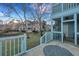 Relaxing outdoor patio area with a view of the pond and surrounding community at 6275 Rolling Fork Rd # C, North Charleston, SC 29406