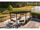Outdoor swing set and firepit provides a relaxing and inviting space to gather and enjoy the outdoors at 641 Sienna Way, Summerville, SC 29486
