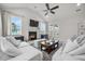 Bright, open-concept living room with a cozy fireplace and comfortable seating for entertaining at 641 Sienna Way, Summerville, SC 29486