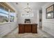 Charming office showcasing abundant natural light, designer lighting, and an elegant wooden desk at 641 Sienna Way, Summerville, SC 29486