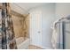 Cozy bathroom includes a shower-tub combo with tile surround and a decorative shower curtain at 7 Seahorse Ct, Isle of Palms, SC 29451