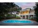 Backyard pool with spacious deck and patio, ideal for outdoor entertaining and relaxation at 7 Seahorse Ct, Isle of Palms, SC 29451