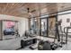 Modern home gym with a full range of exercise equipment and ample natural light at 71 Wentworth St # 302, Charleston, SC 29401