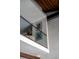 Stylish interior with a glass-railed mezzanine overlooking the living area at 71 Wentworth St # 302, Charleston, SC 29401