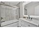Modern bathroom with a glass enclosed shower and a sleek vanity with a matte black faucet at 7629 Vanderbrook Pl, North Charleston, SC 29420