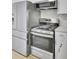 Bright kitchen featuring stainless steel appliances including an oven and microwave at 7629 Vanderbrook Pl, North Charleston, SC 29420