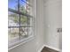 Laundry room featuring a window, white walls and hardwood style floor at 7629 Vanderbrook Pl, North Charleston, SC 29420