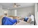 Open-concept view of a modern living room, seamlessly connecting to a dining area, creating a spacious feel at 7629 Vanderbrook Pl, North Charleston, SC 29420