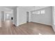 Bright dining area featuring three windows and an open doorway into the living room at 782 Blueway Ave, Summerville, SC 29486