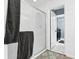 Updated bathroom with subway tile shower and direct access to the laundry room at 8262 Fairview Nursery Rd, Hollywood, SC 29449