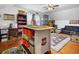 Spacious bonus room with ceiling fan, built-in storage and hardwood floors at 8262 Fairview Nursery Rd, Hollywood, SC 29449