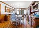 Dining room with hardwood floors, decorative trim, table and chairs at 8262 Fairview Nursery Rd, Hollywood, SC 29449