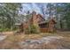 Secluded home with a screened porch and a backdrop of mature trees at 8262 Fairview Nursery Rd, Hollywood, SC 29449