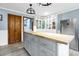 Kitchen featuring a center island, wood countertops, stainless steel refrigerator and blue walls at 8262 Fairview Nursery Rd, Hollywood, SC 29449
